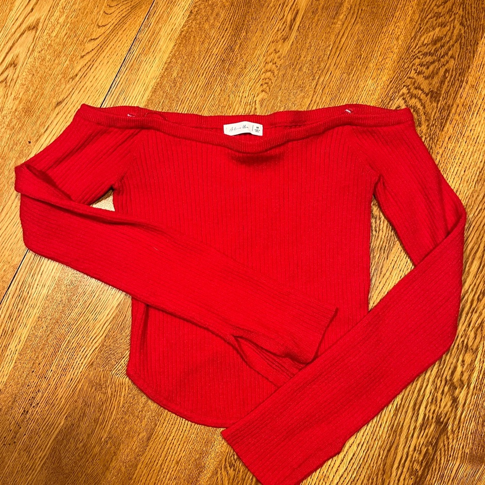 Super cute red off the shoulder sweater